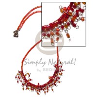 Glass beads in red tones