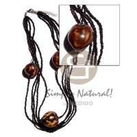 Brown tiger kukui nuts in