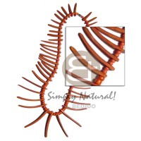 Coral colored graduated coconut indian